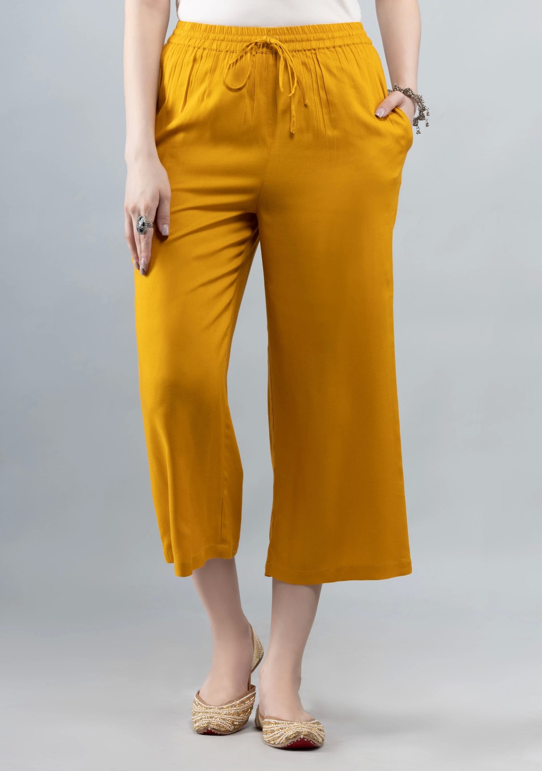 Women Solid Light Mustard Viscose Mid Rise Casual Pants